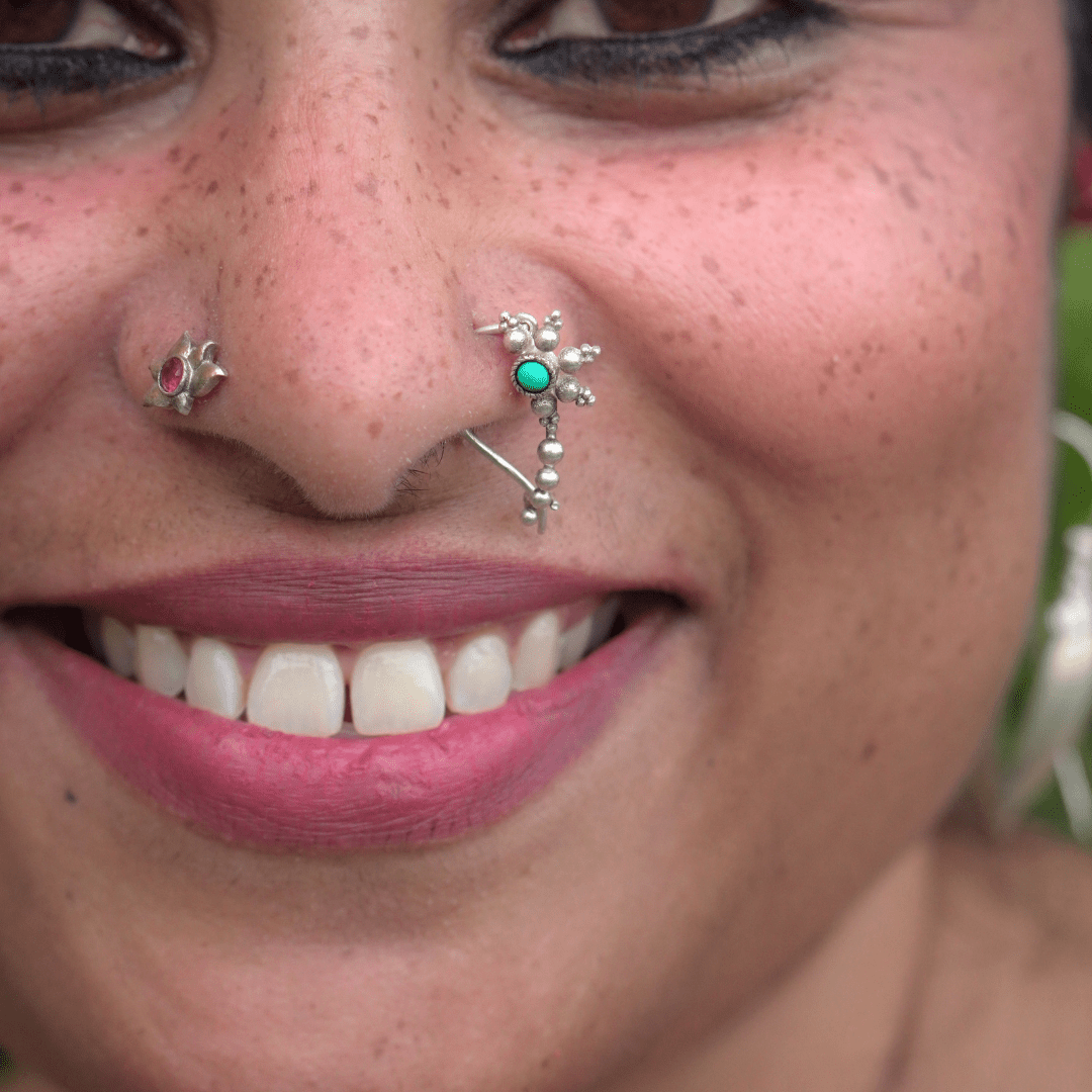 Opposite Sides Three Nose Piercings On One Side Both Sides Double