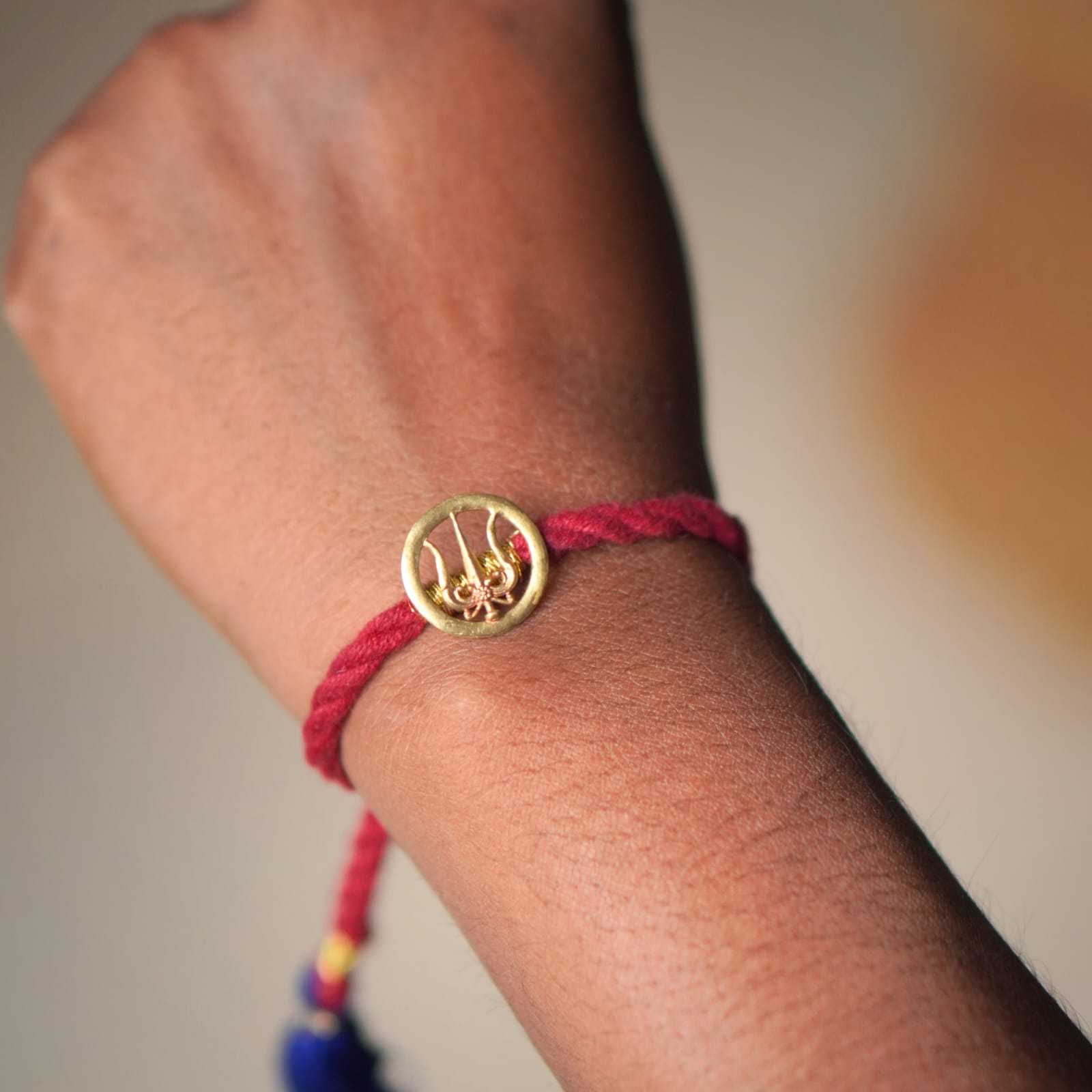 Trishul Rakhi (Brass) - Quirksmith