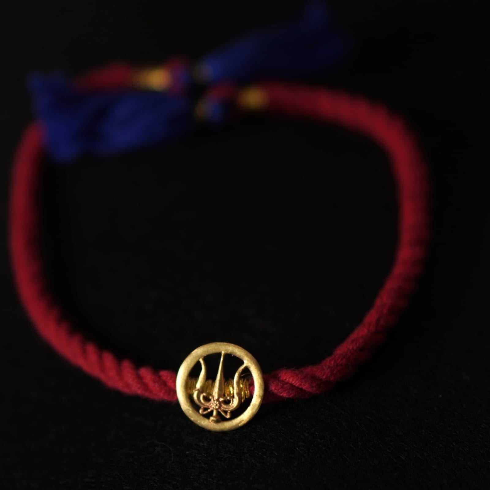 Trishul Rakhi (Brass) - Quirksmith