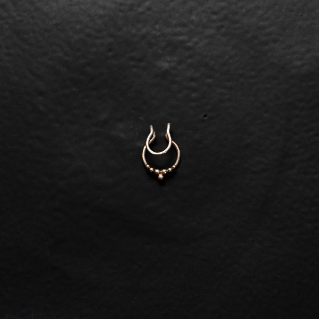 Get your hands on Quirksmith's 92.5 Droplets Septum Ring - Clip-On for instant flair!