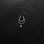 Purchase the Quirksmith Mukta Septum Ring! 92.5 silver clip-on design available.
