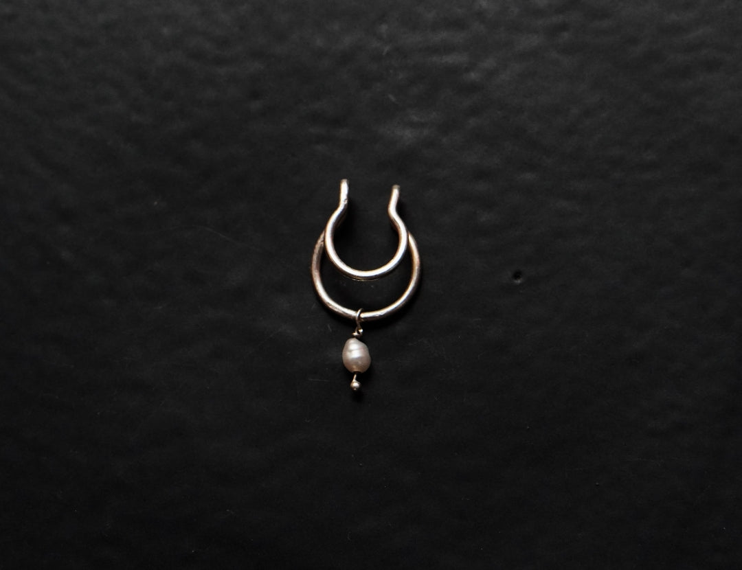 Purchase the Quirksmith Mukta Septum Ring! 92.5 silver clip-on design available.