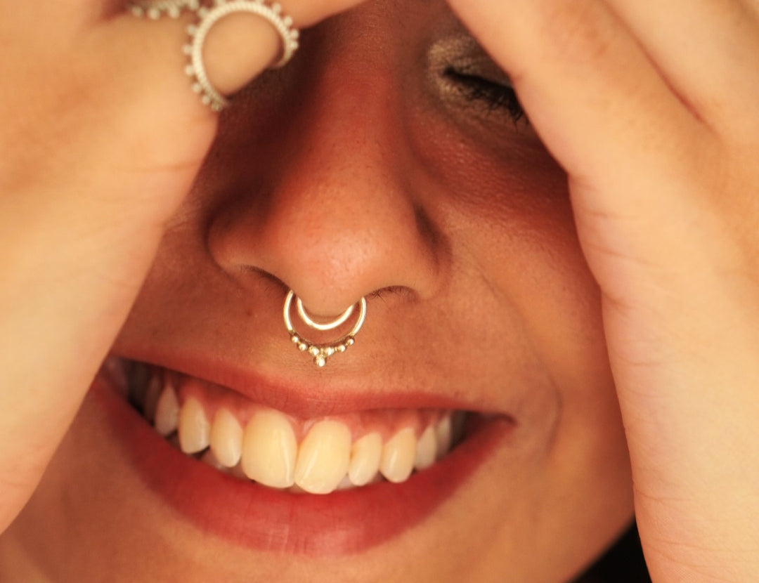 Buy Quirksmith's 92.5 Droplets Septum Ring - Clip-On! Unique design for effortless style.