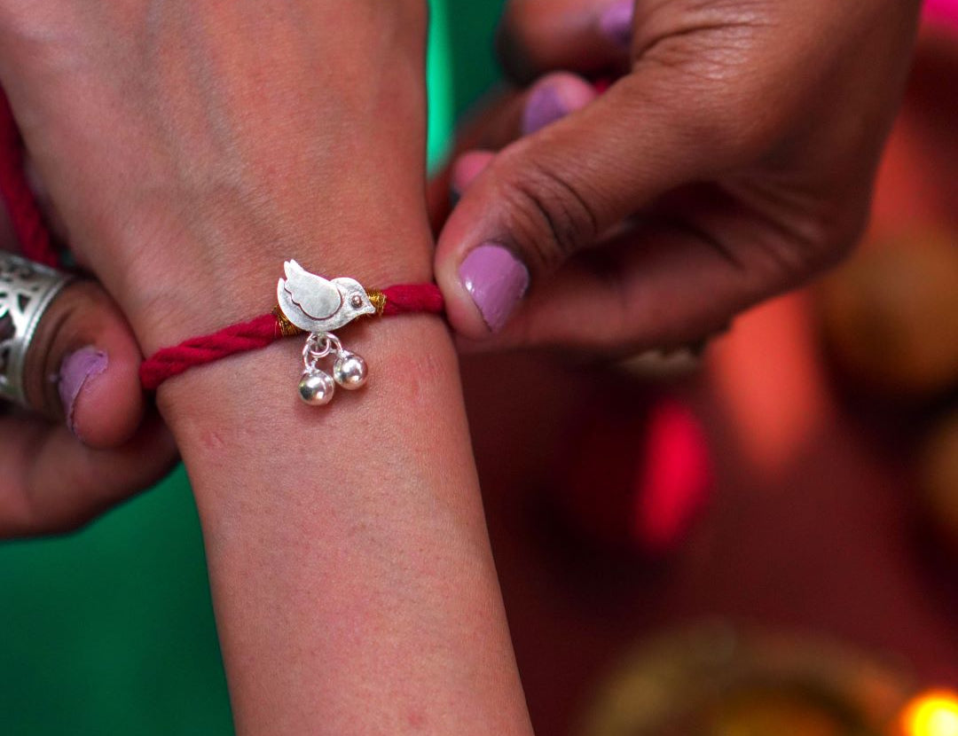 Quirksmith | Elegant Udaan Rakhi – Handcrafted in Silver. Shop Rakhi Online with PAN India Delivery!