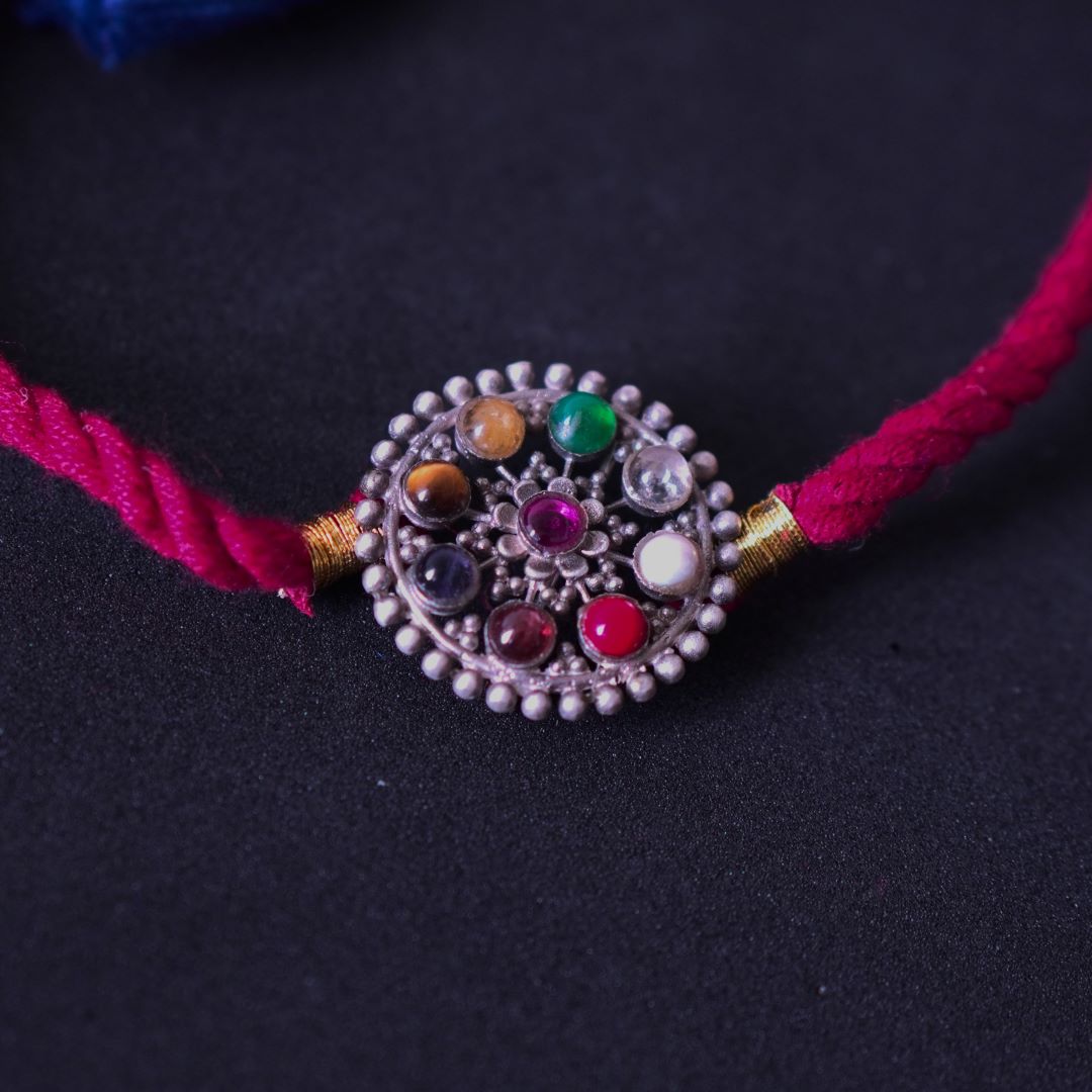 Navrathna Brooch Rakhi - Quirksmith