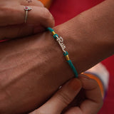 Run Silver Watch charm Rakhi - Quirksmith