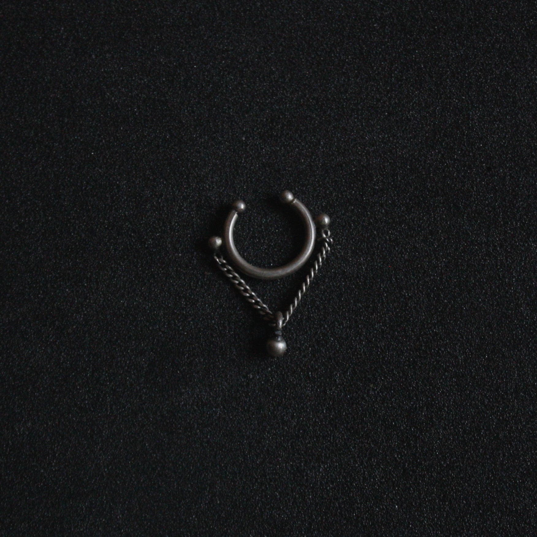 Unveil the uniqueness of Quirksmith's Jhoola Septum Ring, featured on shark tank India. Handcrafted in 92.5 Silver.